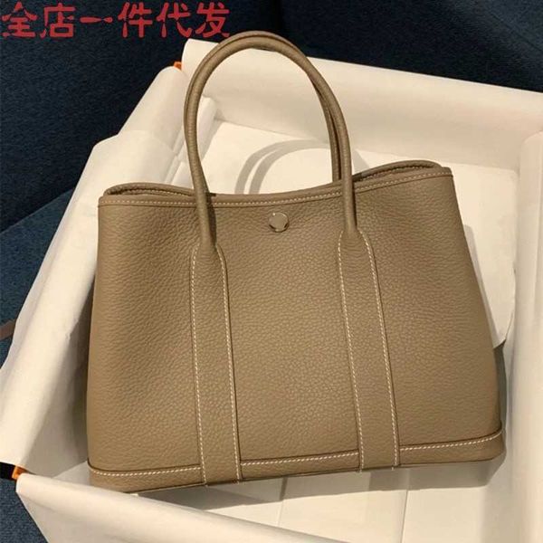 garden party designer totes 2023 new texture soft leather bag large capacity portable bucket bag one shoulder crossbody tote bag commuter wo
garden party designer totes 2023 new texture soft leather bag large capacity portable bucket bag one shoulder crossbody tote bag commuter wo