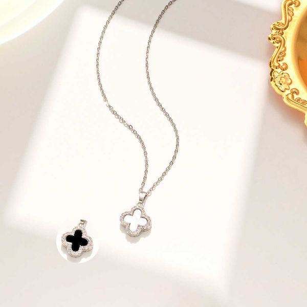 18k pendant chain luxury full diamond clover necklace women's black-and-white double-sided design sense fashion clavicle pendant neckla
18k pendant chain luxury full diamond clover necklace women's black-and-white double-sided design sense fashion clavicle pendant neckla