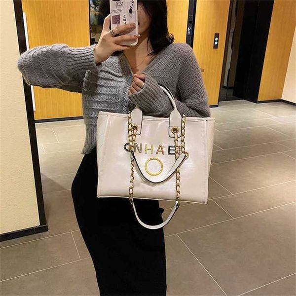 classic luxury handbags beach bags brand metal badge tote bag small evening handbag female capacity large leather one shoulder backpack 0b5r
classic luxury handbags beach bags brand metal badge tote bag small evening handbag female capacity large leather one shoulder backpack 0b5r