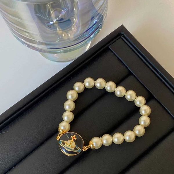 western empress dowager's same enamel pearl bracelet vivian punk wind magnetic buckle saturn jewelry female, Golden;silver
western empress dowager's same enamel pearl bracelet vivian punk wind magnetic buckle saturn jewelry female, Golden;silver