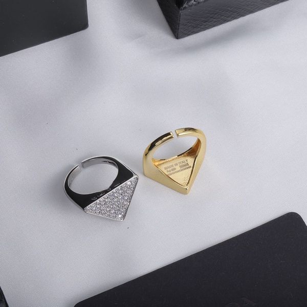 fashion designer men's and women's rings zircon metal triangle logo gold silver adjustable
fashion designer men's and women's rings zircon metal triangle logo gold silver adjustable