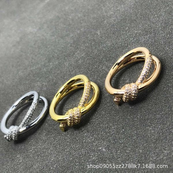 elling new tiffay knot valley ailing's same ring for female minority design simple and luxurious s925 silver plated with 18k gold
elling new tiffay knot valley ailing's same ring for female minority design simple and luxurious s925 silver plated with 18k gold