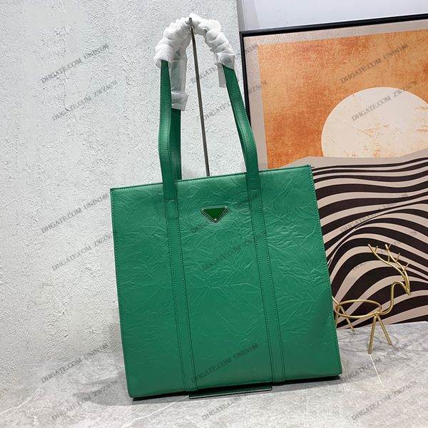 23ss women luxurys designer totes bags onthego handbag geometric metal emblem shouder crossbody ladies handbags cross with original dust bag
23ss women luxurys designer totes bags onthego handbag geometric metal emblem shouder crossbody ladies handbags cross with original dust bag