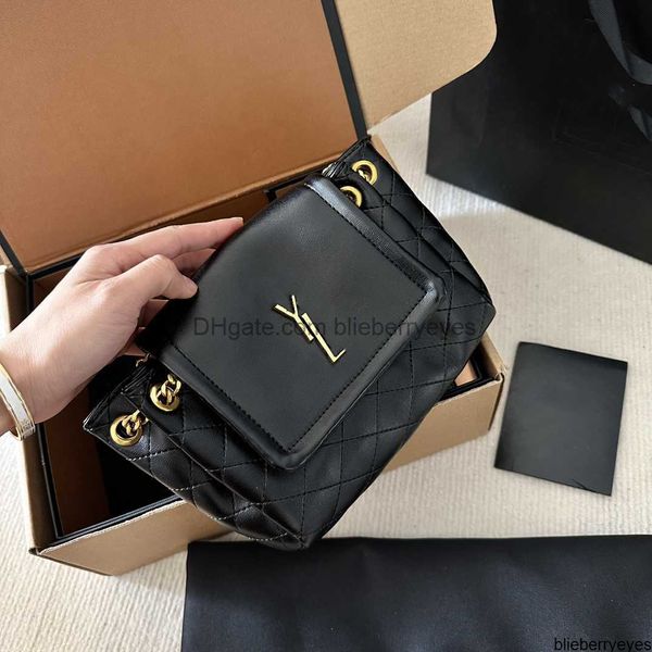 y-shaped the new designer bag cross-body bag features a metal junction the y and diamond quilting on the front flap with chain and leather s
y-shaped the new designer bag cross-body bag features a metal junction the y and diamond quilting on the front flap with chain and leather s