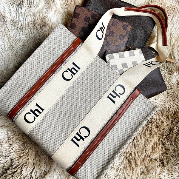 handle woody large book tote beach bag luxury designer womens mens crossbody shoulder bag 10a quality mummy canvas handbag travel mini mediu
handle woody large book tote beach bag luxury designer womens mens crossbody shoulder bag 10a quality mummy canvas handbag travel mini mediu