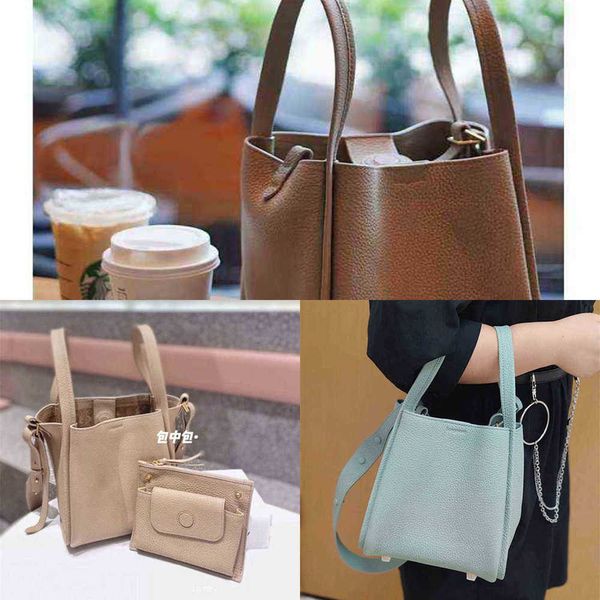 songmont medium size vegetable basket bag series female designer's layer leather large capacity portable bucket
songmont medium size vegetable basket bag series female designer's layer leather large capacity portable bucket
