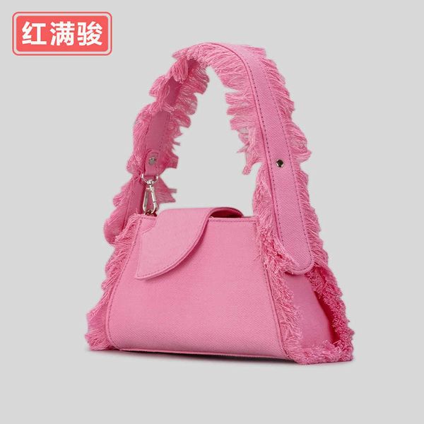 2023 denim canvas underarm bag for women with high-end plush edge tassel niche design handbag
2023 denim canvas underarm bag for women with high-end plush edge tassel niche design handbag