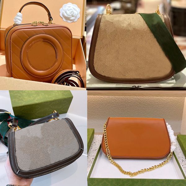 womens blondie shoulder bags beige white canvas leather small medium designer quality high trim gold-toned hardware round interlocking three
womens blondie shoulder bags beige white canvas leather small medium designer quality high trim gold-toned hardware round interlocking three