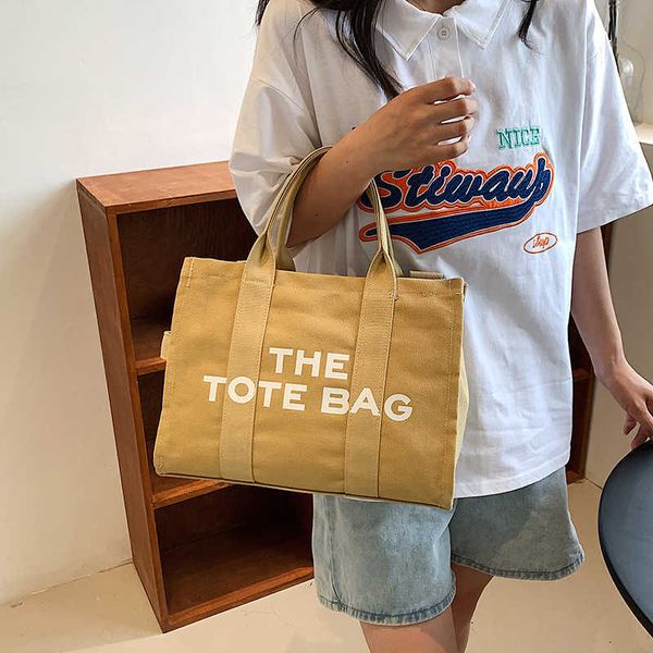 new style simple portable shoulder bag large capacity personalized letter tote bag casual canvas diagonal span bag female
new style simple portable shoulder bag large capacity personalized letter tote bag casual canvas diagonal span bag female