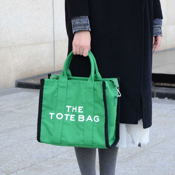 bag women's small design sling single shoulder messenger bag letter printing large capacity tote bag
bag women's small design sling single shoulder messenger bag letter printing large capacity tote bag