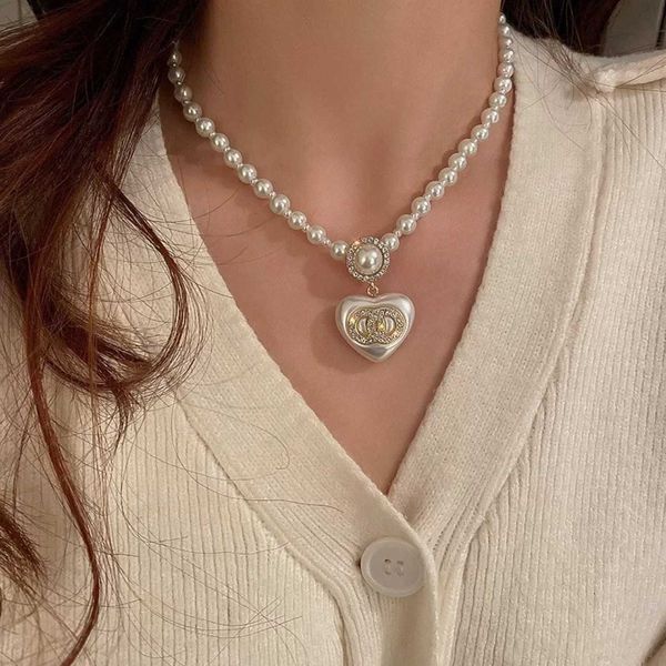 925 silver needle inlaid diamond pearl double ring love necklace french light luxury small group temperament high grade earrings female
925 silver needle inlaid diamond pearl double ring love necklace french light luxury small group temperament high grade earrings female