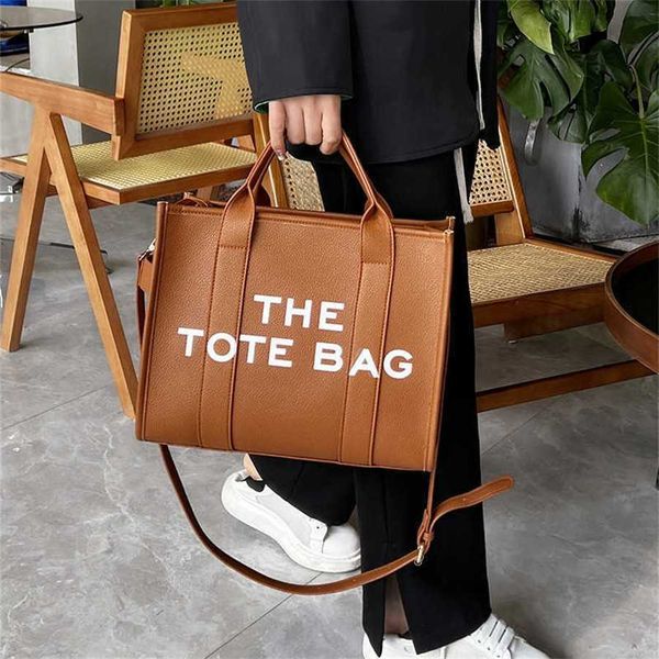 purses women's bag new solid color pu letter tote simple leisure large capacity hand clearance sale
purses women's bag new solid color pu letter tote simple leisure large capacity hand clearance sale