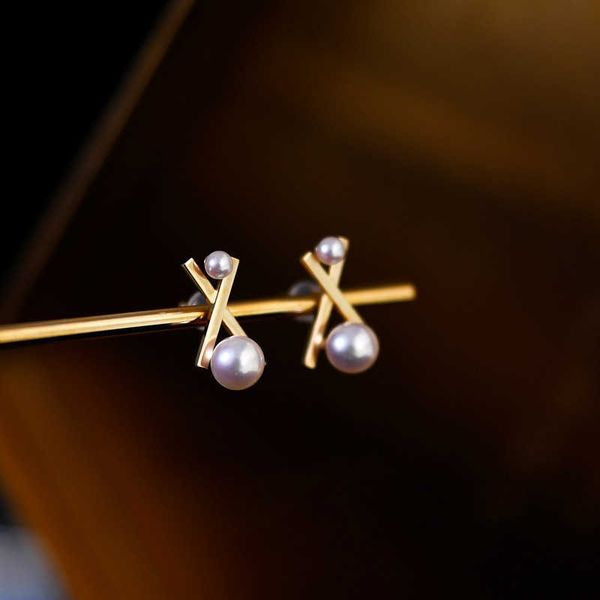 high-quality tiffay's beauty of balance pearl earrings vacuum electroplating 18k gold color retaining cross wood, Golden
high-quality tiffay's beauty of balance pearl earrings vacuum electroplating 18k gold color retaining cross wood, Golden