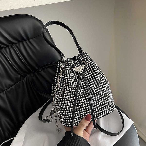 bucket bag women new version foreign style one shoulder chain messenger bag rhinestone drawstring portable women's bag
bucket bag women new version foreign style one shoulder chain messenger bag rhinestone drawstring portable women's bag