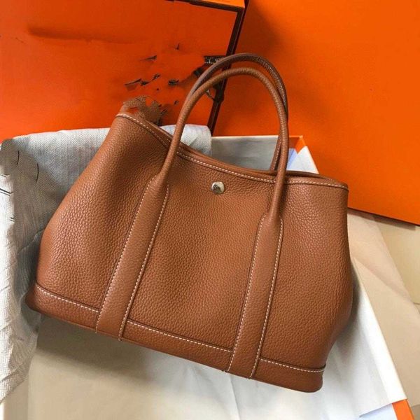 handbags designer her bags fashion luxury brand garden party layer litchi grain cowhide large capacity hand womenelegant classic tote messen
handbags designer her bags fashion luxury brand garden party layer litchi grain cowhide large capacity hand womenelegant classic tote messen