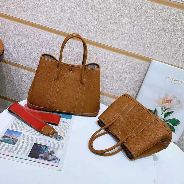 original edition handbags designer her bags fashion luxury brand leather garden simple versatile tote large capacityelegant classic messenge
original edition handbags designer her bags fashion luxury brand leather garden simple versatile tote large capacityelegant classic messenge