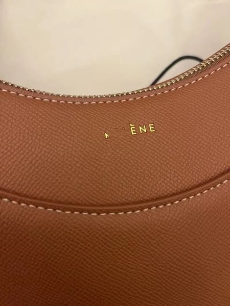 new polene numero dix half-moon bag full-grain textured/smooth calf leather tote designer zip closure crossbody women hobo handbags shoulder
new polene numero dix half-moon bag full-grain textured/smooth calf leather tote designer zip closure crossbody women hobo handbags shoulder