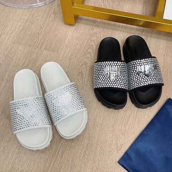 brand casual 2022 summer new triangular standard rhinestone thick soled sandals for women to wear fashionable, Black
brand casual 2022 summer new triangular standard rhinestone thick soled sandals for women to wear fashionable, Black