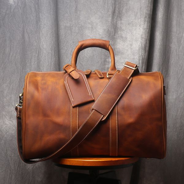 duffel bags vintage men's cowhide leather shortdistance carry hand luggage weekend fitness large travel duffle bag messenger 230202
duffel bags vintage men's cowhide leather shortdistance carry hand luggage weekend fitness large travel duffle bag messenger 230202