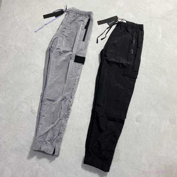 brand designers pants stone metal nylon pocket embroidered badge casual trousers thin reflective island size m-2xl, Black
brand designers pants stone metal nylon pocket embroidered badge casual trousers thin reflective island size m-2xl, Black