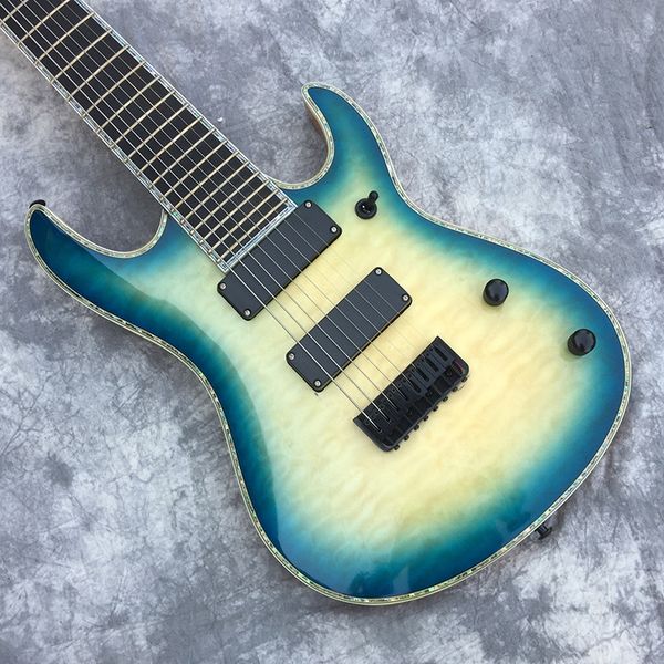 custom 8 string electric guitar, quilted maple, rose wood fingerboard, abalone wrapped edge, black accessories, custom guitar
custom 8 string electric guitar, quilted maple, rose wood fingerboard, abalone wrapped edge, black accessories, custom guitar