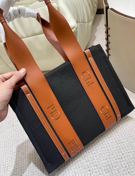 canvas tote bag luxury shopping bags wholesale classic womens wallets letter shoulder crossbody beach bags woody travel designer handbag med
canvas tote bag luxury shopping bags wholesale classic womens wallets letter shoulder crossbody beach bags woody travel designer handbag med