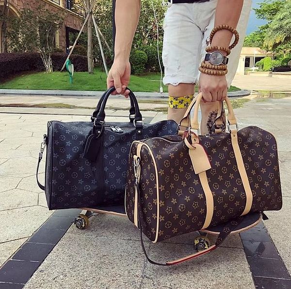 1-22022 luxury fashion men women high-quality travel duffle bags brand designer luggage handbags with lock large capacity sport ba cw, Red;black
1-22022 luxury fashion men women high-quality travel duffle bags brand designer luggage handbags with lock large capacity sport ba cw, Red;black
