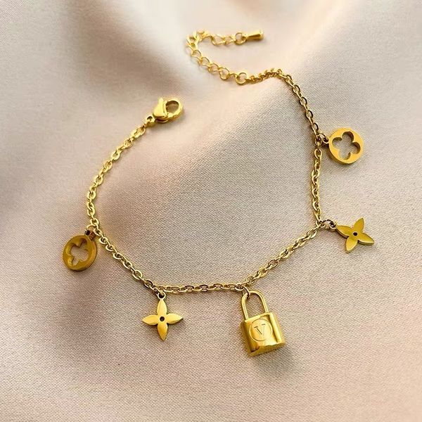elegant brand clover lock pendant stainless steel necklace bracelet for gift, Silver
elegant brand clover lock pendant stainless steel necklace bracelet for gift, Silver
