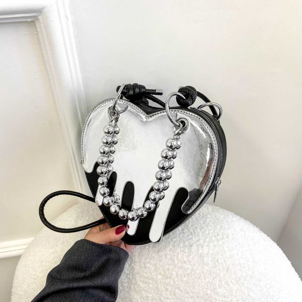 crossbody bags small design dark gothic womens bag new spicy girls heart chain bag fashion shoulder bags 230204
crossbody bags small design dark gothic womens bag new spicy girls heart chain bag fashion shoulder bags 230204