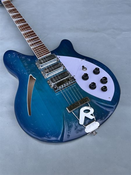model 360 blue electric guitar 12 string rick guitars 24 frets semi hollow body 3 toaster ric pickups
model 360 blue electric guitar 12 string rick guitars 24 frets semi hollow body 3 toaster ric pickups