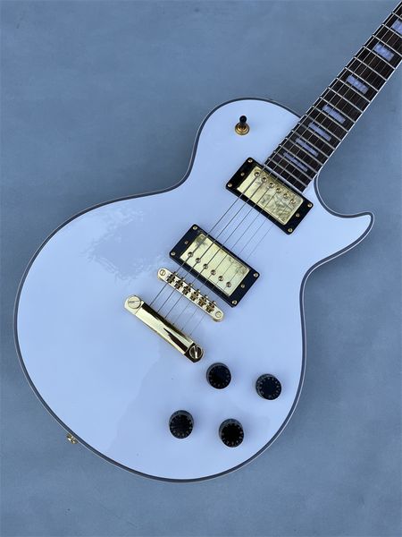 custom shop rosewood fingerboard. electric guitar golden hardware, white, real picture shooting
custom shop rosewood fingerboard. electric guitar golden hardware, white, real picture shooting
