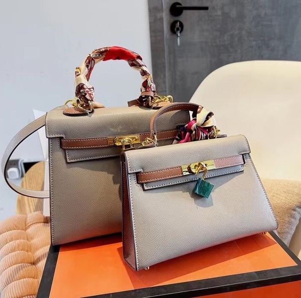 designer bag woman handbag messenger bag shoulder crossbody litchi textured togo layer leather color blocked classic pochette trumpet mini b
designer bag woman handbag messenger bag shoulder crossbody litchi textured togo layer leather color blocked classic pochette trumpet mini b