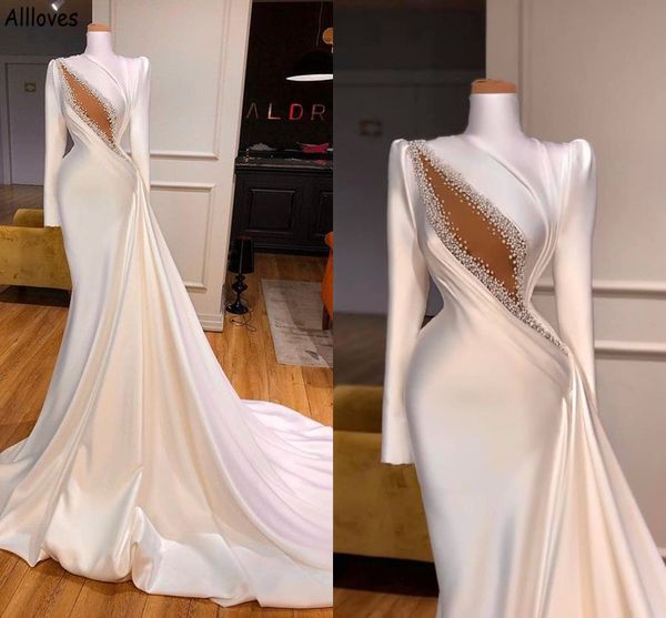 modest satin high collar trumpet mermaid wedding dresses for brides with long sleeves hollow out pearls vestidos de novia saudi arabia dubai, White
modest satin high collar trumpet mermaid wedding dresses for brides with long sleeves hollow out pearls vestidos de novia saudi arabia dubai, White