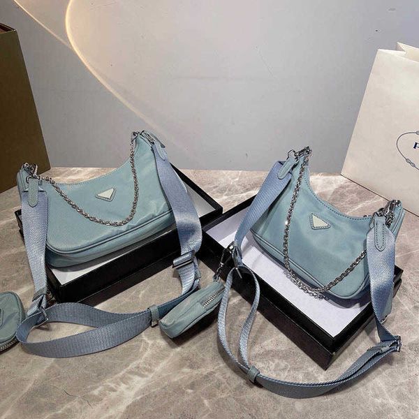shoulder bags brown handbag nylon edition underarm enamel metal triangular women handbags tote designer bag re-nylon hobo bag 230204
shoulder bags brown handbag nylon edition underarm enamel metal triangular women handbags tote designer bag re-nylon hobo bag 230204