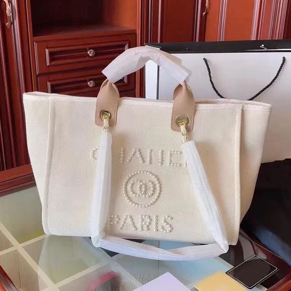 designer bags classic flower beach tote bag luxury large capacity high bag celebrity party transparent beige black versatile fashion bag
designer bags classic flower beach tote bag luxury large capacity high bag celebrity party transparent beige black versatile fashion bag