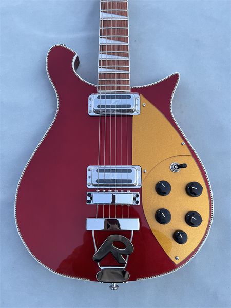 custom 6 string guitar,ricken 660 electric guitar,cherry red paint body with tailpiece,golden guard
custom 6 string guitar,ricken 660 electric guitar,cherry red paint body with tailpiece,golden guard