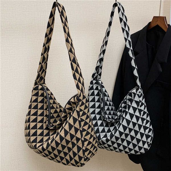 new bag popular triangle check versatile shoulder bag version large capacity casual messenger bag
new bag popular triangle check versatile shoulder bag version large capacity casual messenger bag