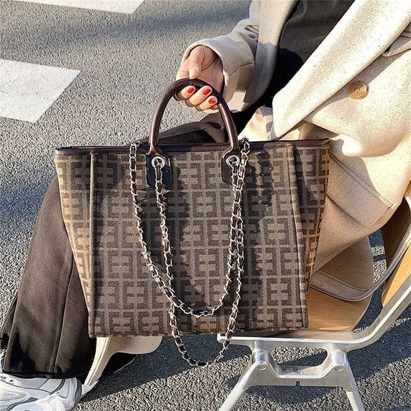 designer handbag store 60% off canvas small tote new hand letter chain single shoulder messenger bag
designer handbag store 60% off canvas small tote new hand letter chain single shoulder messenger bag