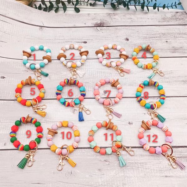 new personalized bracelet key chain straw hat rainbow silicone bead elastic rope chain, Silver
new personalized bracelet key chain straw hat rainbow silicone bead elastic rope chain, Silver