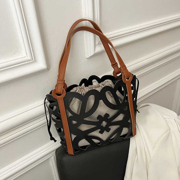 small design hollow-out woven bag women's new high-capacity one-shoulder tote bag fashion basket handbag
small design hollow-out woven bag women's new high-capacity one-shoulder tote bag fashion basket handbag