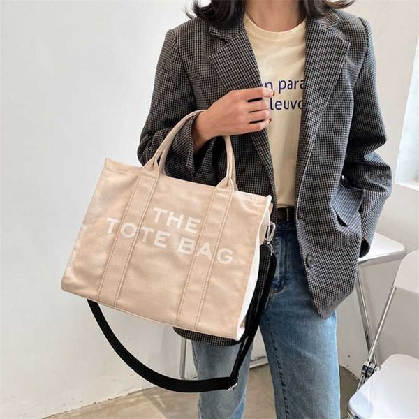 2023 bags clearance outlets fashion portable tote simple women's letter commuting hand canvas single-shoulder diagonal bag
2023 bags clearance outlets fashion portable tote simple women's letter commuting hand canvas single-shoulder diagonal bag
