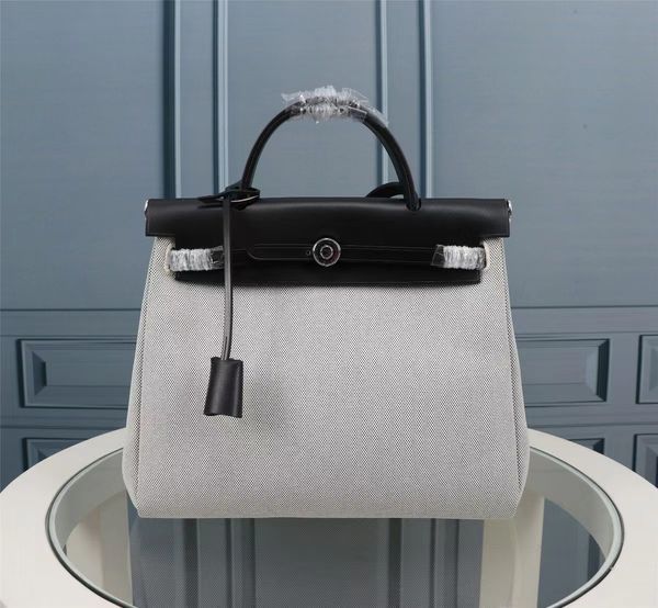 a fashion solid color 5-color optional women's bag handbag shoulder bag messenger bag large capacity waterproof canvas tote bag
a fashion solid color 5-color optional women's bag handbag shoulder bag messenger bag large capacity waterproof canvas tote bag