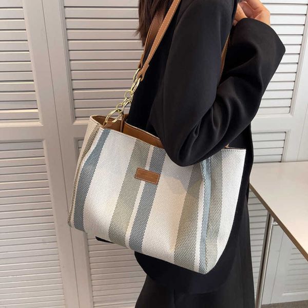 stuff sacks spring and autumn big stripe large capacity shoulder temperament style royal sister fashion women's bag
stuff sacks spring and autumn big stripe large capacity shoulder temperament style royal sister fashion women's bag
