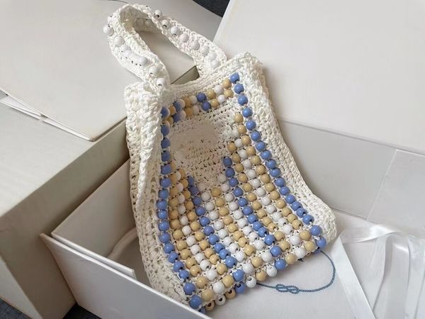 women designer totes beach bag woven design with colorful wooden balls coconut fiber and handles ladies casual purses clutch
women designer totes beach bag woven design with colorful wooden balls coconut fiber and handles ladies casual purses clutch