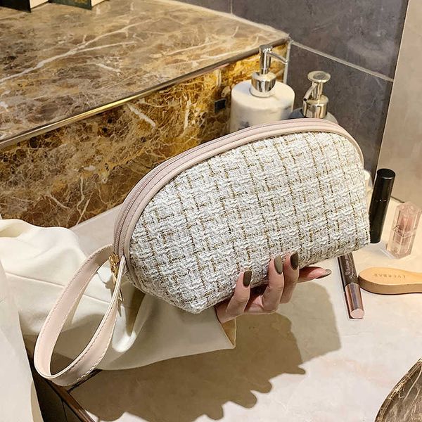 cosmetic bags & cases makeup women's half-round seashell out small hand small simple and portable washing bag
cosmetic bags & cases makeup women's half-round seashell out small hand small simple and portable washing bag