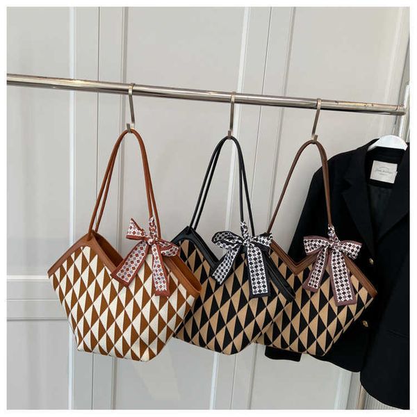 messenger bags checker shoulder autumn new fashion sense large capacity tote armpit bag for women
messenger bags checker shoulder autumn new fashion sense large capacity tote armpit bag for women