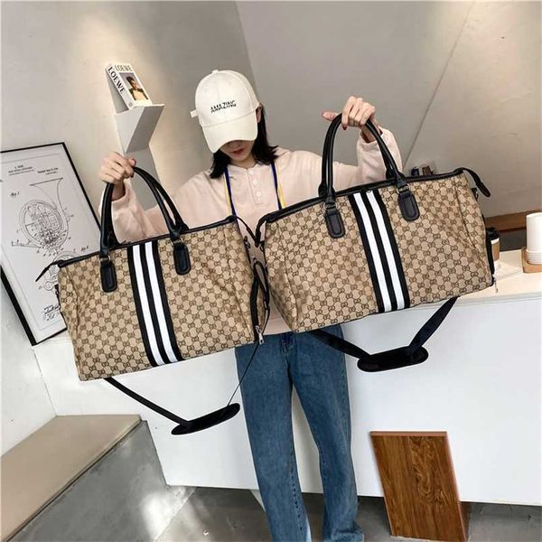 2023 bags clearance outlets new cloth letter high capacity travel bag women's waterproof black and white strip men's sports bag fa
2023 bags clearance outlets new cloth letter high capacity travel bag women's waterproof black and white strip men's sports bag fa