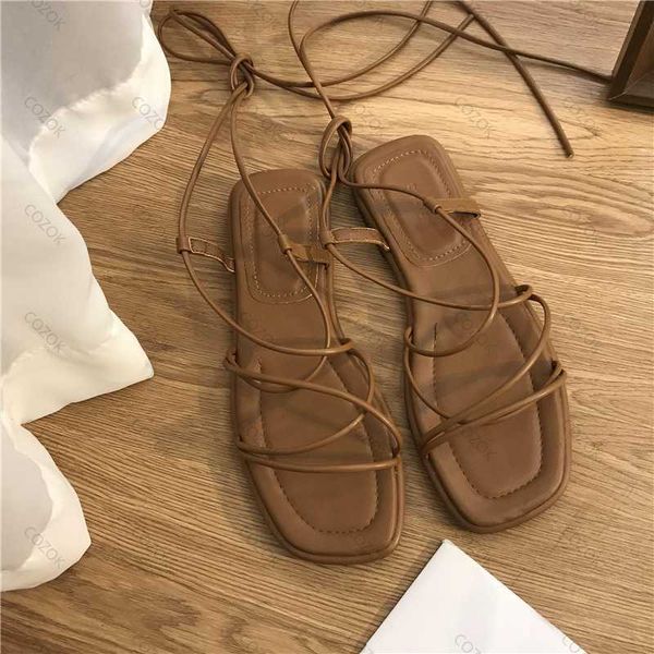 sandals sandals women summer new 2023 beach fashion flat casual cross-tie open toe fairy style narrow band shoes black rome sandals g230207
sandals sandals women summer new 2023 beach fashion flat casual cross-tie open toe fairy style narrow band shoes black rome sandals g230207