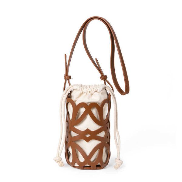 bag female 2023 new niche design hollow out drawstring canvas cylinder bag personalized diagonal shoulder
bag female 2023 new niche design hollow out drawstring canvas cylinder bag personalized diagonal shoulder