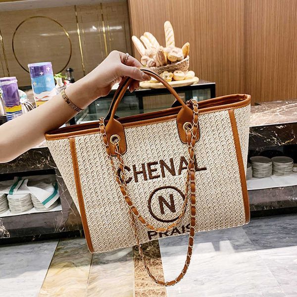 stores export handbags online summer new women's bag version large capacity tot chain shoulder portable woven beach letter
stores export handbags online summer new women's bag version large capacity tot chain shoulder portable woven beach letter